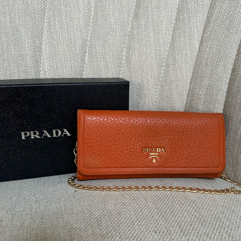 PRADA Orange Pebbled Leather wallet on chain